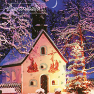 Snowy church at night