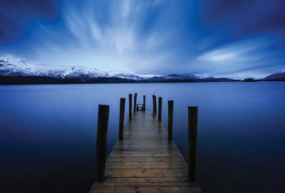 Winter landscape with a pier